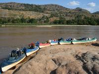 Canoes lined up along Manambolo River -  Photo: Janet Oldham